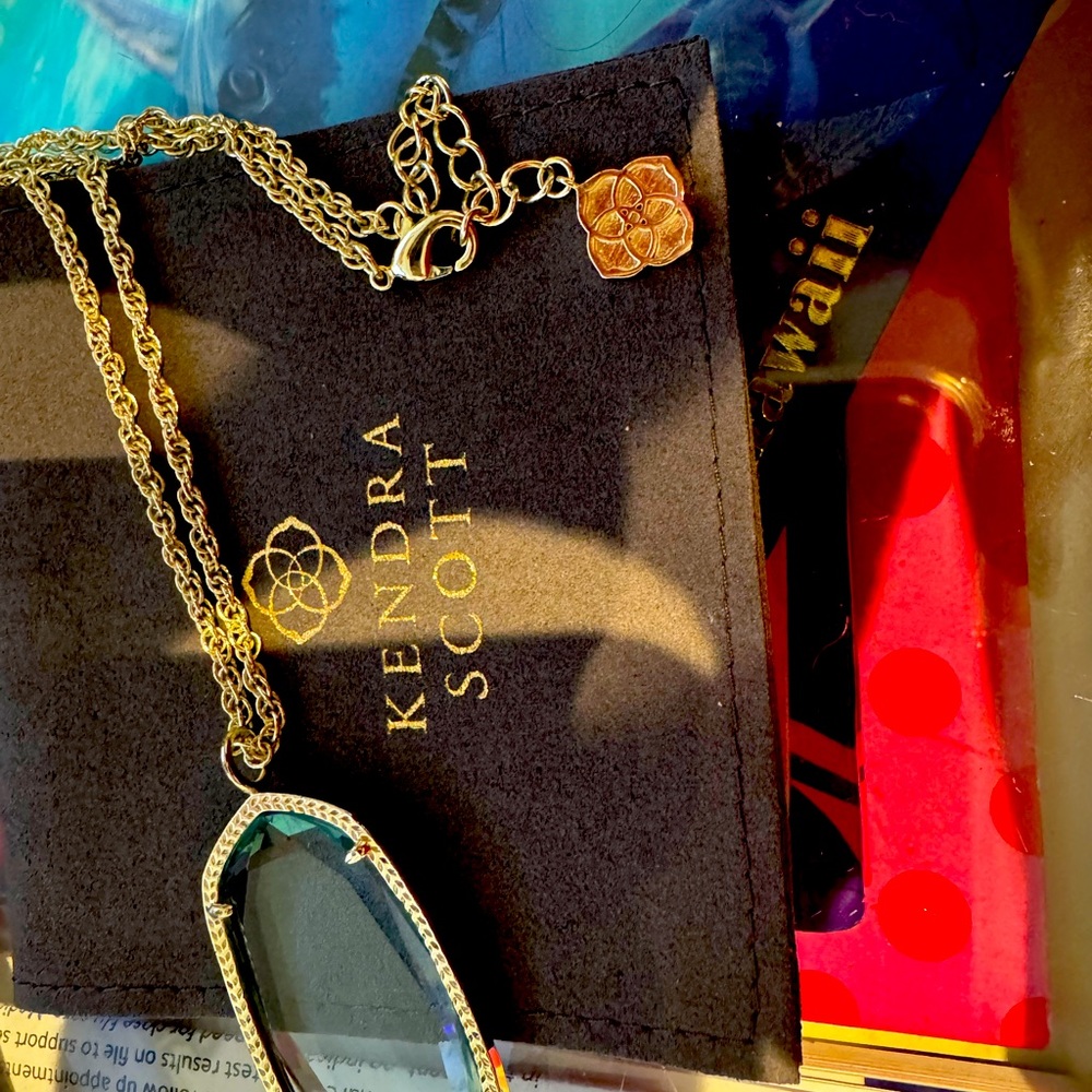 Kendra Scott necklace.